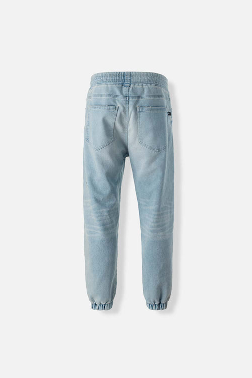 Card slide image -  JOGGER DE MOVIES EN DENIM TONO MEDIO CON ELÁSTICO EN CINTURA PARA HOMBRE