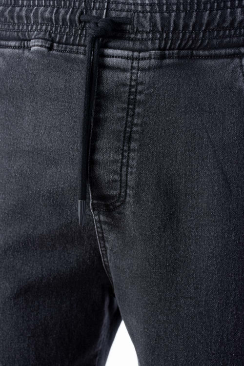 Card slide image -  JOGGER DE MOVIES NEGRO PARA HOMBRE
